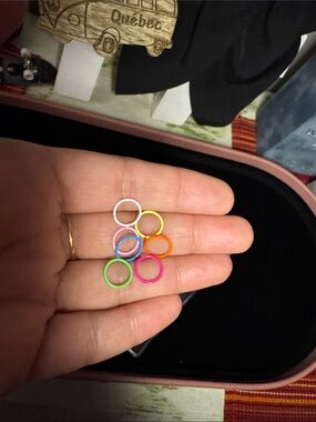 Neon coloured nose rings.